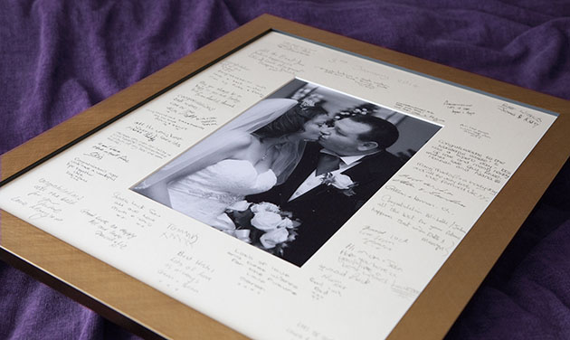 framed wedding photo in signature mount with gold frame
