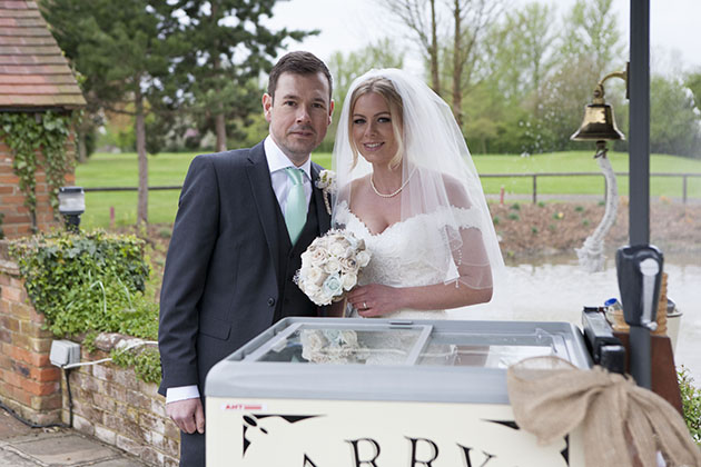bride and groom with ice cream cart
