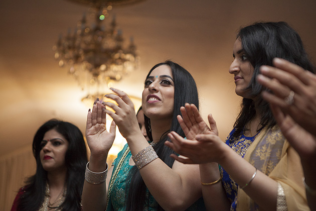 Women clapping hands during the dance at a party