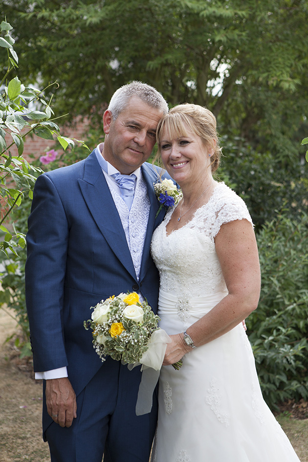 Portrait of bride and groom in garden at Little Channels