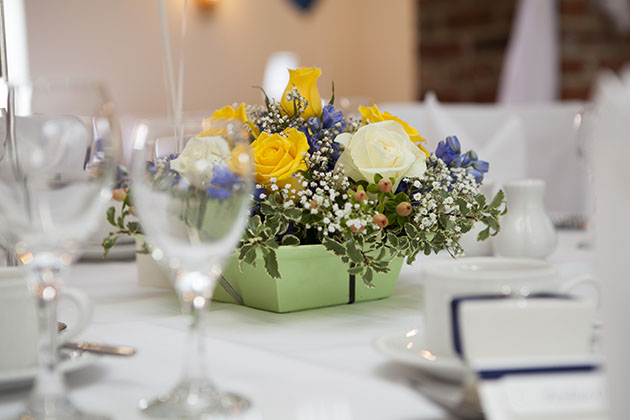 wedding table decoration of yellow flowers