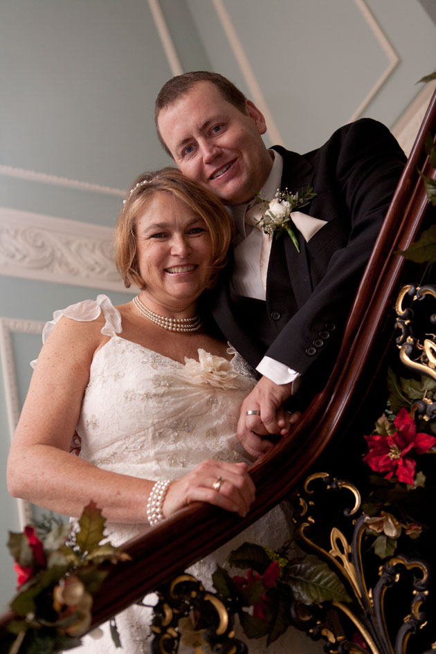 bride and groom stairs hylands house essex