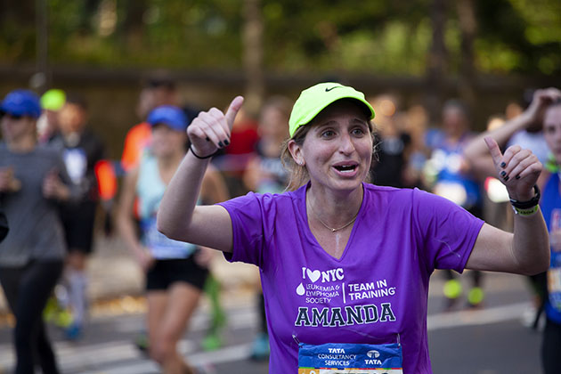 New York marathon runner with thumbs up