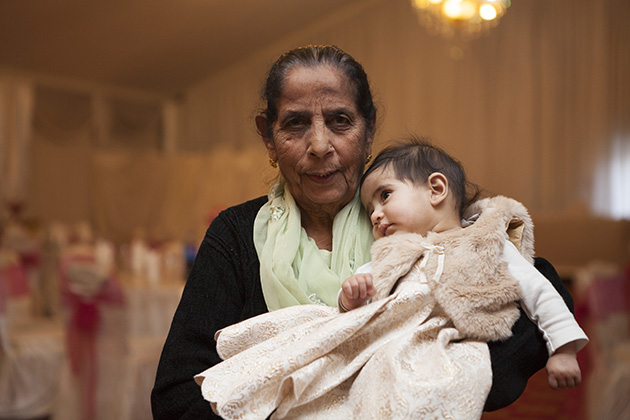 New born held by her Indian great grandmother