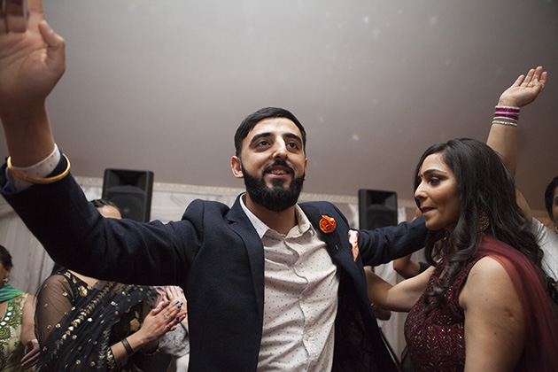 Man with arms outstretched on the dance floor