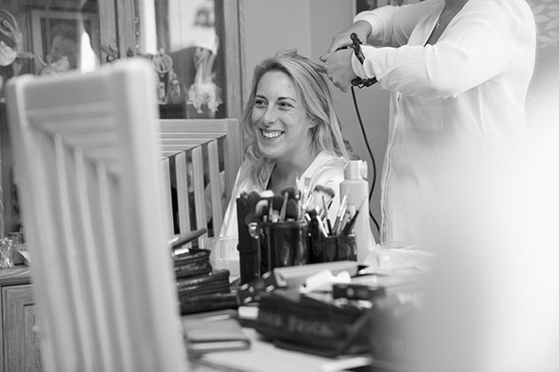 bride having hair done at home