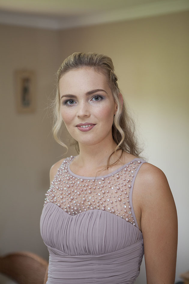 portrait of bridesmaid looking at camera