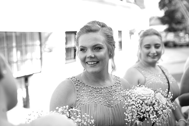 candid photo of bridesmaids before wedding ceremony