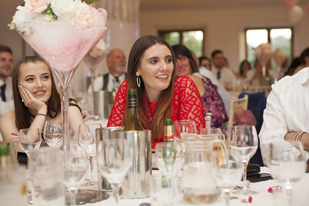 wedding guests listening to wedding speeches