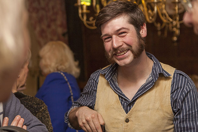 Informal portrait of a young man at a party