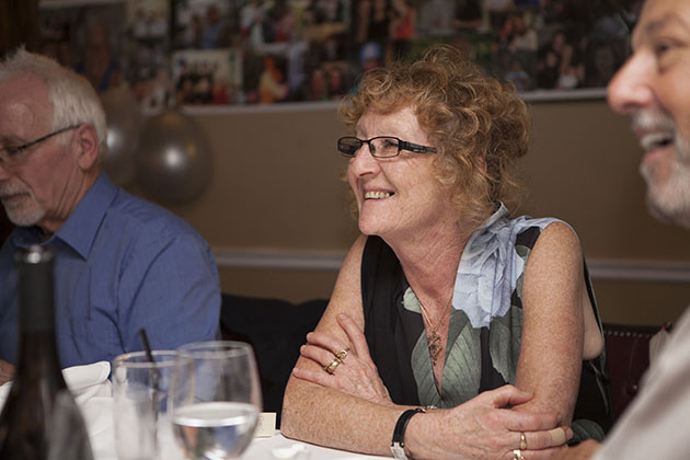 Woman at a table at a family get together