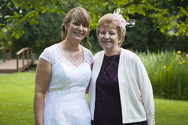 Bride with friend in grounds at Pontlands Park
