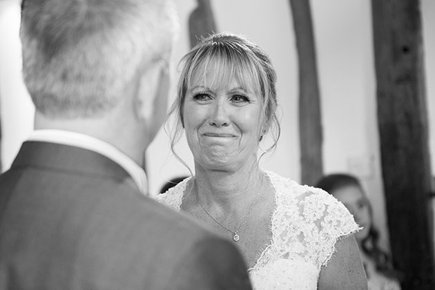 Bride looking at groom during wedding ceremony