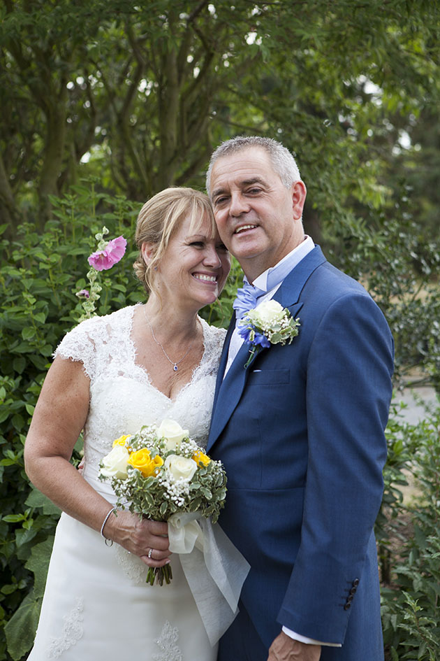 Portrait of bride and groom in garden at Little Channels