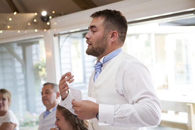 Man making a speech at a wedding
