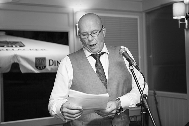 Best man making a speech at the microphone