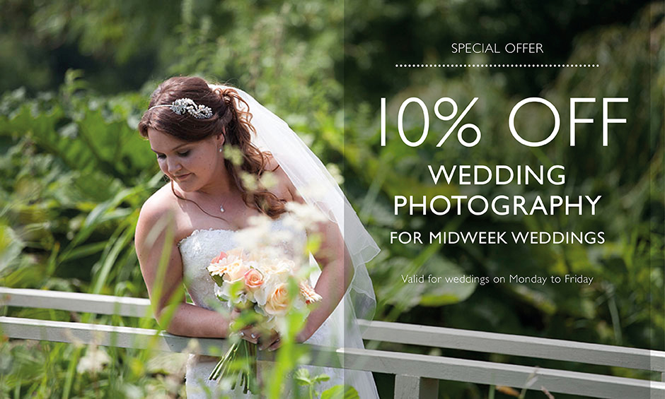 Bride leaning on bridge and looking down